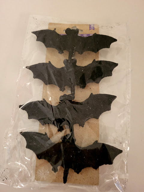 Bat, Branches, and Bows. Share NOW.#Halloween, #halloweendecor, #halloweendecorations, #DollarTreeCraft, #eclecticredbarn